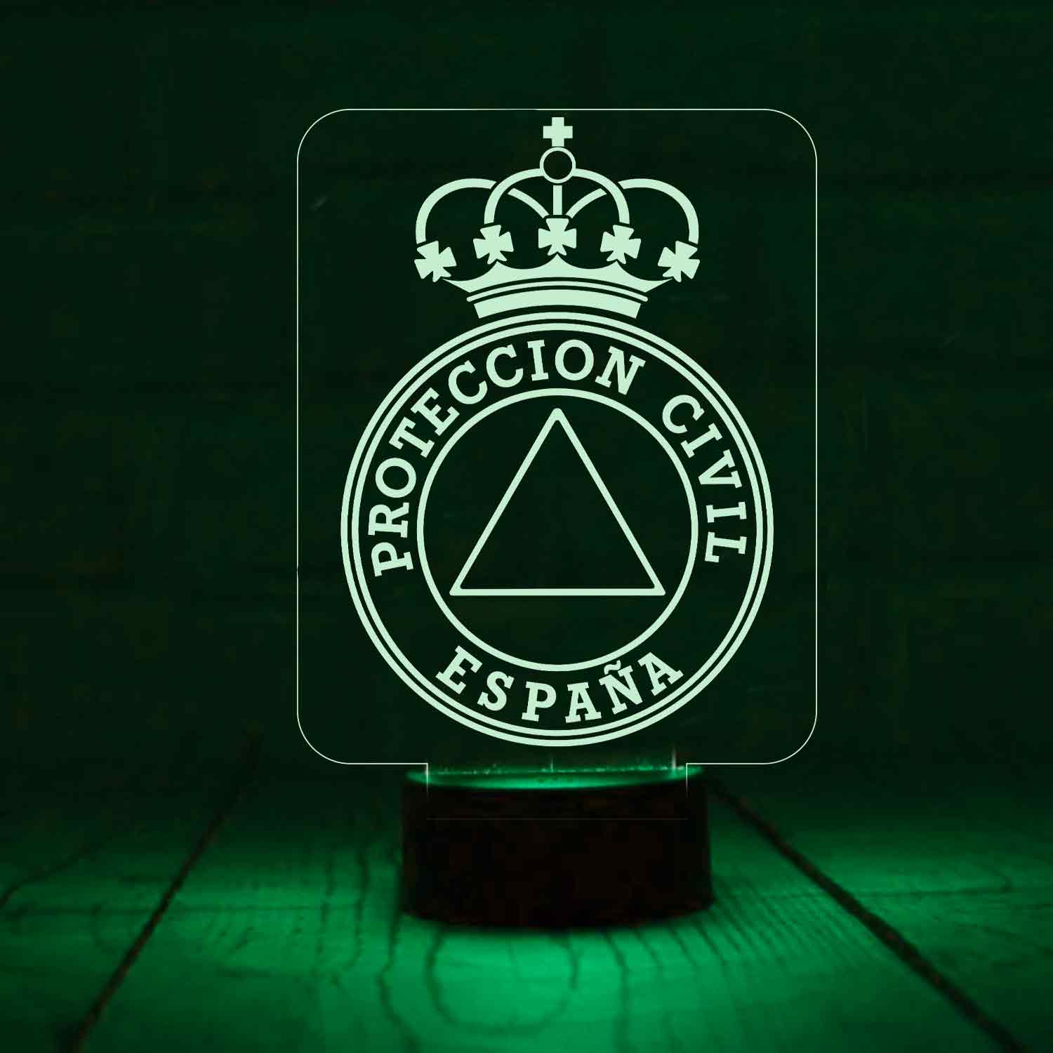 Lámpara LED de Protección Civil España grabada en metacrilato con iluminación RGB, base LED y mando a distancia.