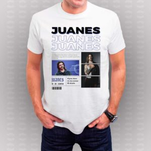 Camiseta blanca de Juanes con diseño vintage, fotografías del cantante colombiano y referencias a sus álbumes y canciones más populares.
